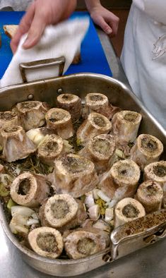 a pan filled with food sitting on top of a counter