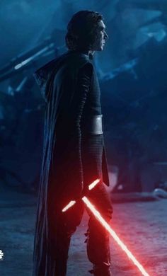 the star wars character is standing in front of a dark background with his lights on