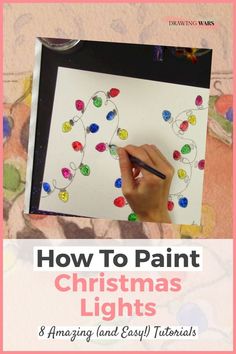 a person drawing christmas lights on paper with the title how to paint christmas lights and amazing easy