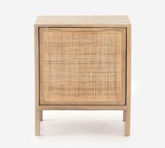 the side table is made out of wood and has a rattan pattern on it