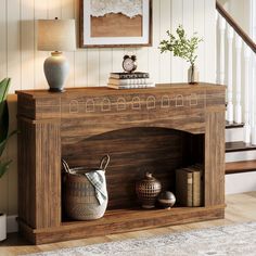 a wooden shelf with baskets and vases on it in front of a stair case