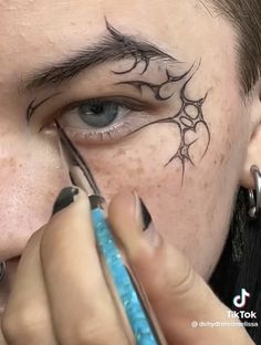 Cool Punk Hairstyles, Graffic Liner Black, Cybergoth Eyeliner, Graphic Eyebrows, Cheek Makeup Art, Cool Eyeliner Looks Creative, Demon Eyeliner, Cybersigilism Eyeliner, Eyeliner Face Art