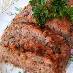 meatloaf on a floral plate with parsley