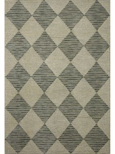 a gray and white rug with diamonds on it