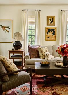 a living room filled with furniture and decor