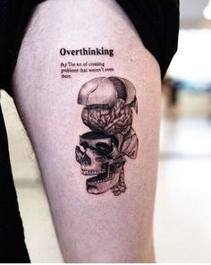 a woman's leg with a tattoo on it that reads overthiking out the end of creating problems that women haven