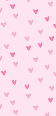 pink hearts are arranged on a light pink background for valentine's day wallpaper