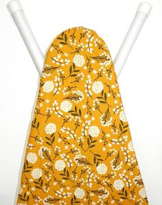 an ironing board cover with flowers on it