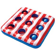 an inflatable pool with four balls and two cups on the bottom is red white and blue