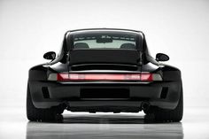 the back end of a black sports car