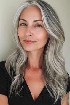 Embracing silver hair is embracing a statement. Once exclusive to the fashion-forward, it's now a sophisticated, widely embraced trend. It offers a spectrum from shiny metallic tones to subtle charcoal shades, providing options for every skin tone and personality. Browse more of our silver hair ideas. Long Grey Hair, Women Haircuts Long, Gorgeous Gray Hair, Grey Hair Inspiration, Beautiful Gray Hair, Silver Hair Color, Silver Grey Hair, Natural Gray Hair, Grey Wig