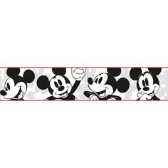 a mickey mouse wallpaper border with black and white polka dots on the border,