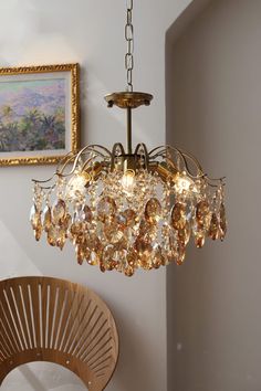 a chandelier hanging from the ceiling in a room