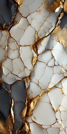 an abstract marble background with gold and white paint on the top, bottom and bottom