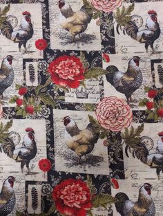 roosters and roses on black fabric with red flowers in the center is an image of chickens