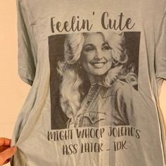 a woman's t - shirt with an image of dolly monroe on it