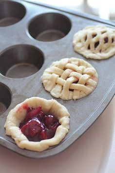 four pies in a muffin tin with jelly filling