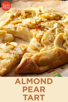 a close up of a slice of pizza on a table with the words almond pear tart