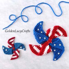 two crocheted bows with stars and stripes on them, one is red white and blue