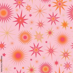 a pink background with red and yellow stars on it's sides, all in different sizes