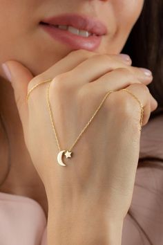 Minimalist Moon Star Gold Necklace Pendant, 14k Solid God Dainty Necklace for Women, Celestial Moon Star Jewelry, Christmas Gift for Mom* Moon and Star pendants are two separate pieces.  FEATURES• Made to order• Solid Gold (real gold, not gold plated or gold filled material)• Gold Karat: 10K (417) - 14K (585) - 18K (750) (optional)• Moon and Star pendants are two separate pieces.• Pendant Moon Height: 0.39 Inches (1.00 cm)• Pendant Star Height: 0.20 Inches (0.51 cm)• Pendant Moon Width: 0.12 Inc Star Gold Necklace, Moon And Star Pendant, Gold Necklace Pendant, Gold Necklace For Women, Gold Pendant Jewelry, Celestial Necklace, Christmas Gift For Mom, Solid Gold Necklace, Gold Moon