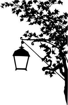 a black and white silhouette of a tree with a lamp post