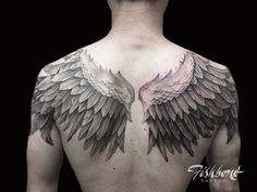 the back of a man with wings on his chest