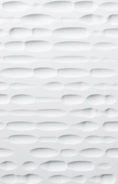 an abstract white wall with circles on it