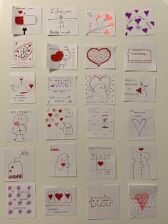 a white refrigerator covered in lots of different types of paper cut into squares and hearts