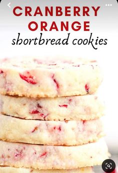 cranberry orange shortbread cookies stacked on top of each other with the text overlay