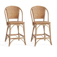 two wicker bar stools, one with a seat and the other has a back rest