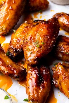 chicken wings with sauce and parsley on the side