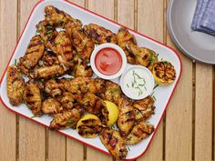 chicken wings with dipping sauce on a plate