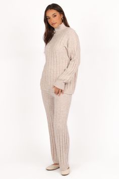 DETAILS   When comfort meets chic, your wardrobe wins. Introducing our top and pant knit set, designed to elevate your everyday style with ease. F eaturing a high neckline and long sleeves with ribbed cuffs for that perfect finishing touch. Pair it with our high-waisted pants, crafted with an elastic waistband that ensures a flattering fit without sacrificing comfort.   top and pant set   oversized style top  high neckline  long sleeves with ribbed cuff  high waisted pant  elastic waistband  str Top And Pants Set, Oversized Style, Knit Set, High Neckline, S Models, High Waisted Pants, Stretch Fabric, Ribbed Knit, Pants Set