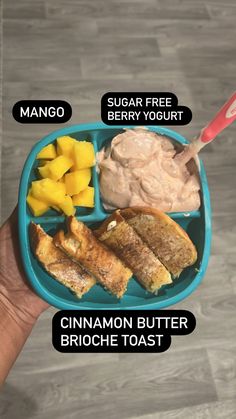 a person holding a blue plate with food on it and the words, sugar free berry yogurt cinnamon butter brioche toast