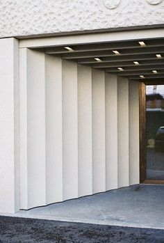 an empty parking garage with the door open