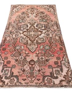 an antique persian rug is shown on a white background