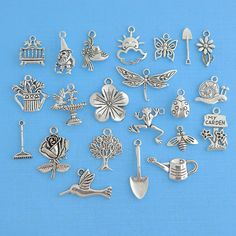 Gardening themed collection of antique silver tone charms, in a zinc alloy metal. Measurements: 10mm - 30mm Hole Size: 2mm You will receive 1 set of 22 charms. PLEASE NOTE: From time to time I may need to substitute one of the charms for another of equal or greater value... all keeping with the theme of the collection. Need more? Just send us a message through the contact us form, instant chat, or at mailto:info@bohemianfindings.com. Bulk pricing is available! All of our products are lead and ca Crimp Bead Covers, Weave Shop, Charm Collection, Beading Tools, Beading Needles, Wine Charms, Drop Beads, Leather Weaving, Bead Shop