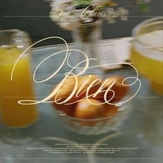 an advertisement with oranges and juice on a table