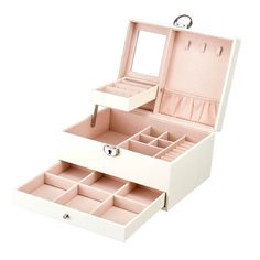 an open white jewelry box with two drawers and one drawer on the bottom, filled with various compartments