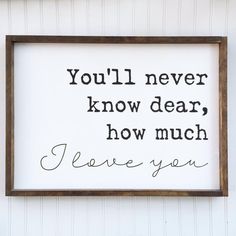 a framed sign that says you'll never know dear how much i love you