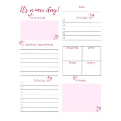 a pink planner with hearts and the words it's a new day