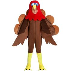 a man in a turkey costume standing with his hands on his hips