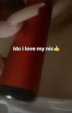 someone is holding their hand over the edge of a toilet with text that reads, i do i love my nic