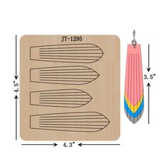 a wooden cutting board with an image of three different colored pencils on top of it