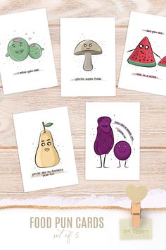 four cards with different fruits and vegetables in them on a wooden surface, one has an eggplant, the other is watermelon