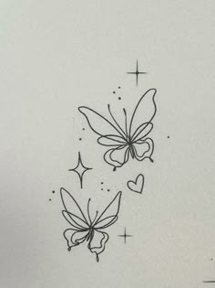 two butterflies with hearts and stars on the back of their wings, flying in the air