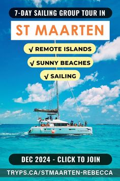 a boat with the words st maarten on it in front of blue water