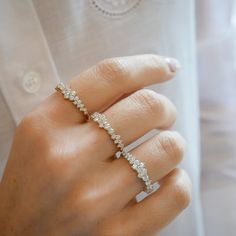 The Diamond Cluster Ring is like wearing a constellation on your finger. Featuring 23 diamonds set in an asymmetric grouping along half of the band, this style adds a twinkle to any stack. Luxury Dainty Cluster Ring In White Gold, Diamonf Cluster Ring, Small Diamond Cluster Ring, Clustered Diamond Ring, Diamond Band Rings Women, Fine Jewelry White Gold Cluster Ring, Fine Jewelry White Cluster Rings, Formal White Cluster Ring, Right Hand Diamond Rings