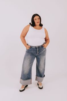 Looking for the perfect pair of jeans that will make you stand out? Look no further than our PLUS SIZE - Look At Me Now Jeans! These washed denim jeans feature a button and zipper closure, real front and back pockets, and a high waisted design. Plus, you can choose to keep them cuffed or roll them down for a versatile look. With a sun faded finish, you'll be turning heads wherever you go. Get ready to say "look at me now!" Details Washed denim jeans Button and zipper closure Real front and back Nursing Friendly Tops, Nursing Friendly Dress, Look At Me Now, Plus Size Looks, Plus Jumpsuit, Exclusive Dress, Jeans Button, Basic Dress, Tank Top Long Sleeve